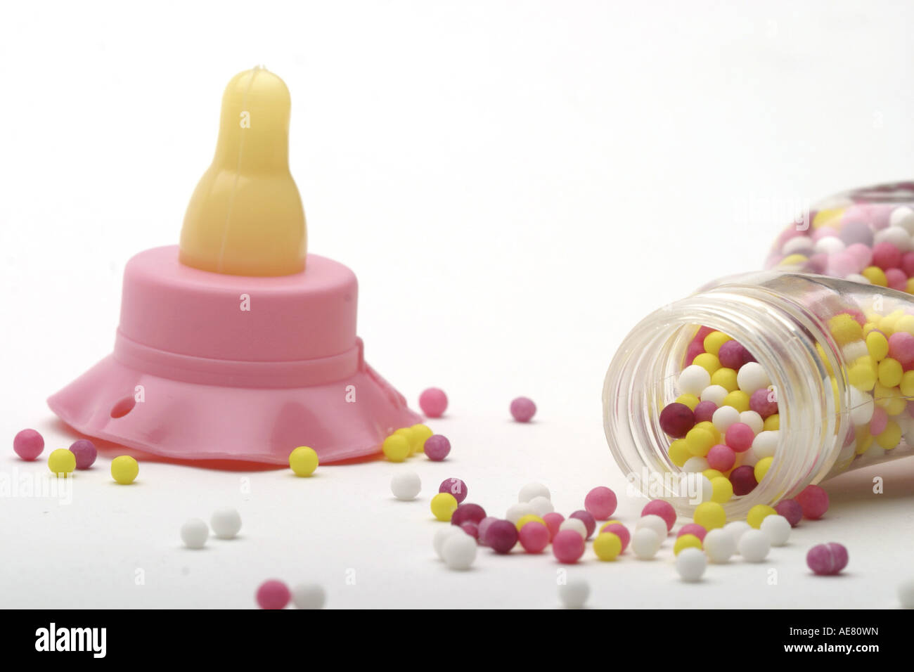 candy beads in baby bottle Stock Photo