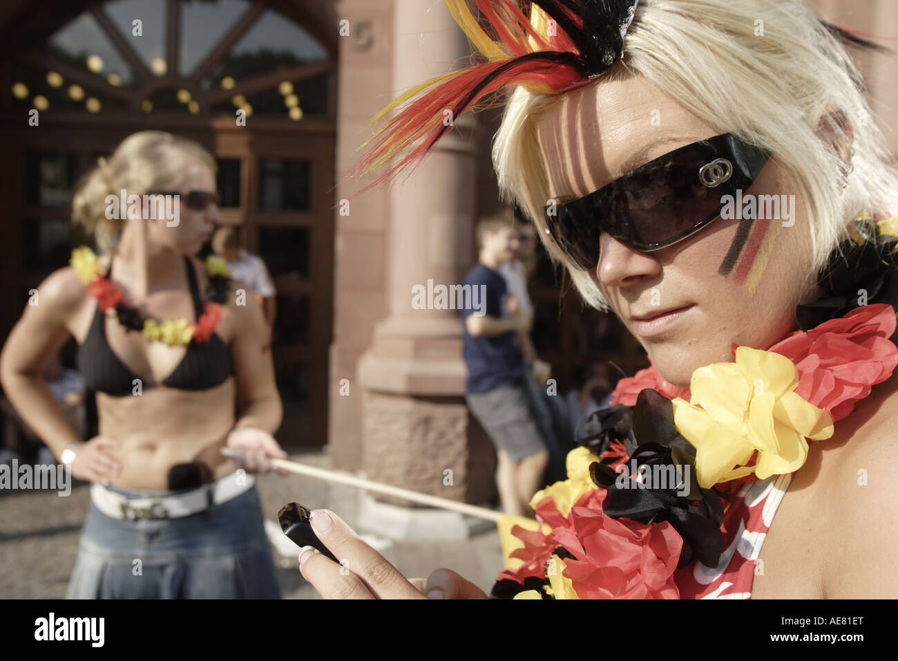 Two female football supporters rooting for the German team during World Cup 2006 Stock Photo