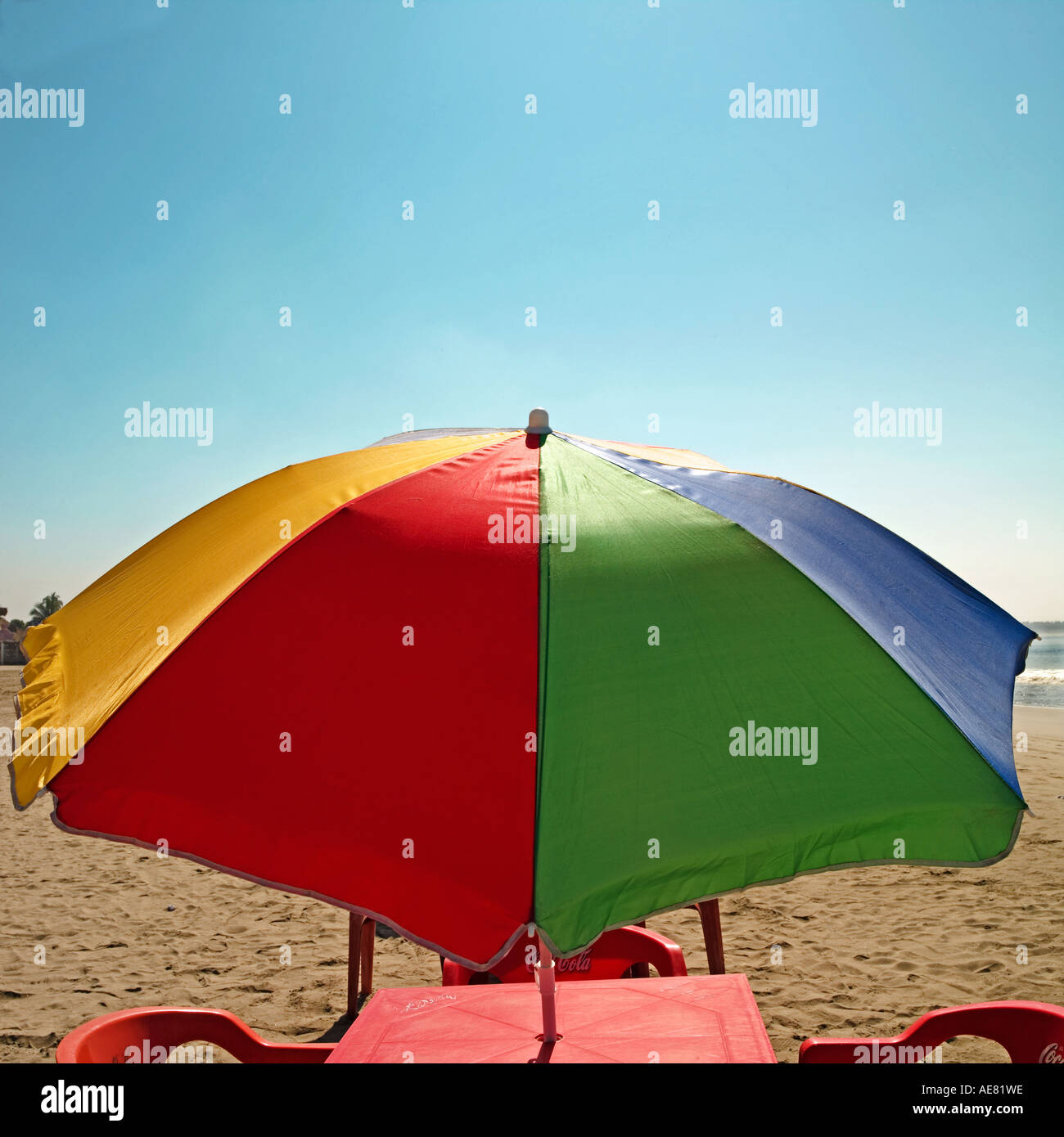 beach umbrella primary colours centre shot Stock Photo - Alamy