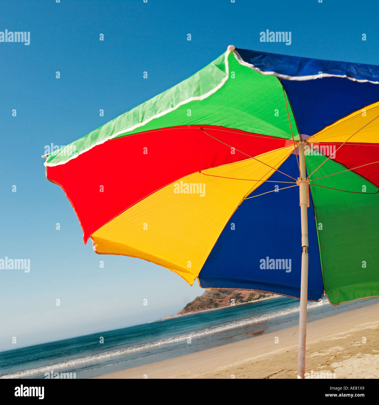 beach umbrella by the Pacific ocean Stock Photo - Alamy