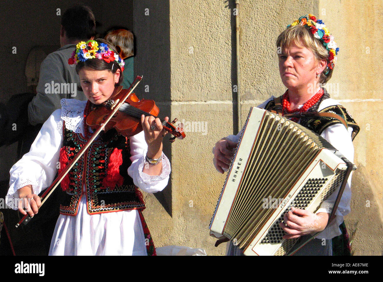 Two female musicians play traditional Polish folk music in Market Square,  Krakow, Poland Stock Photo - Alamy