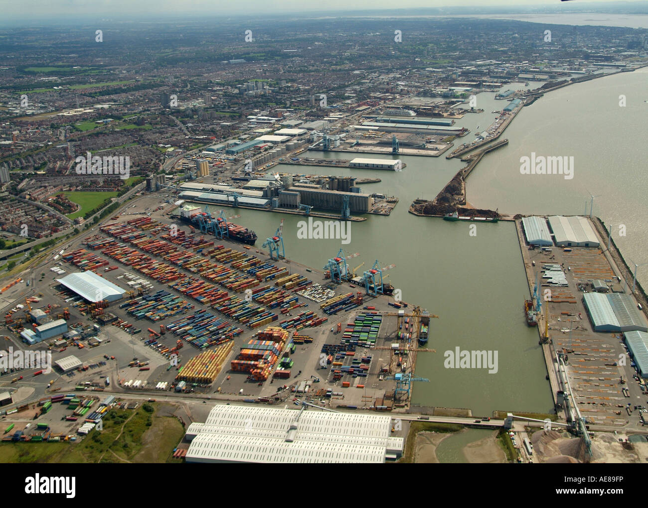 Liverpool Docks, Bootle, Merseyside, North West England, aerial view,with Liverpool behind Stock Photo