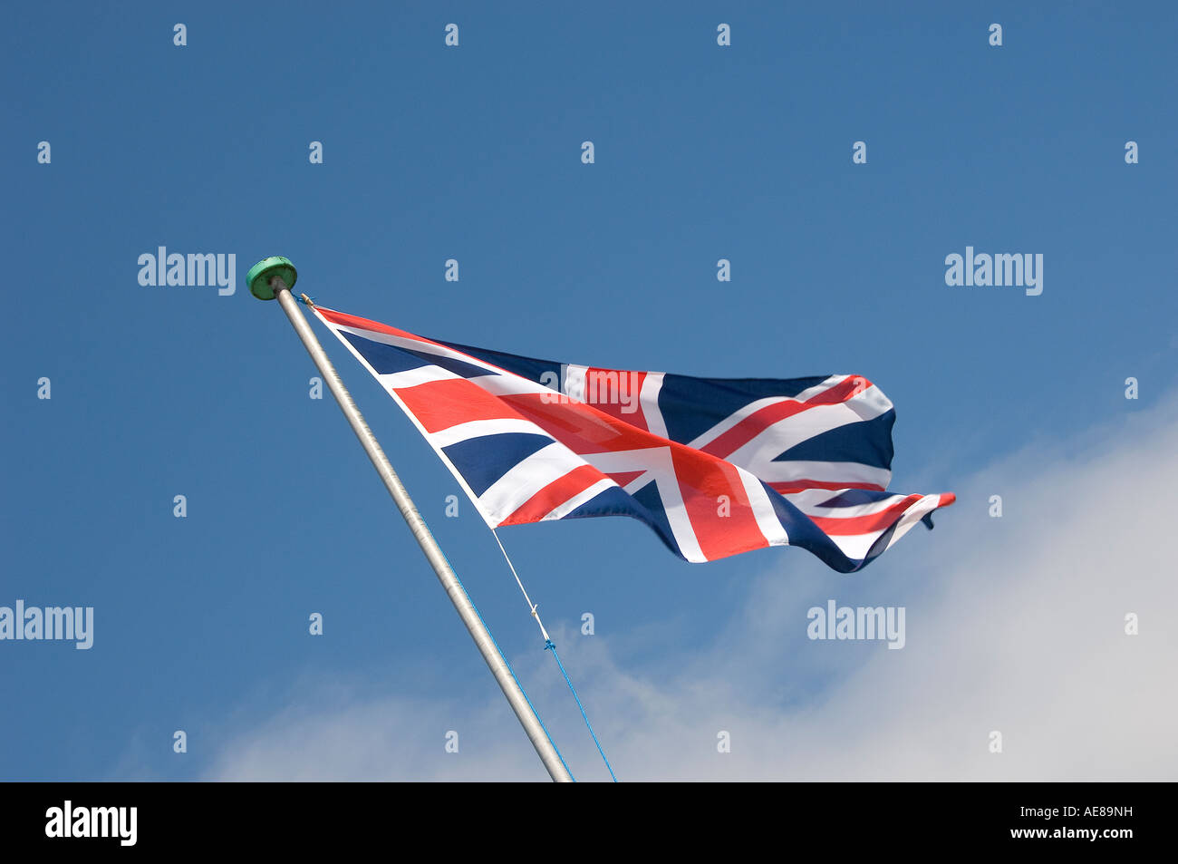 Union Jack flag against blue sky England UK United Kingdom GB Great ...