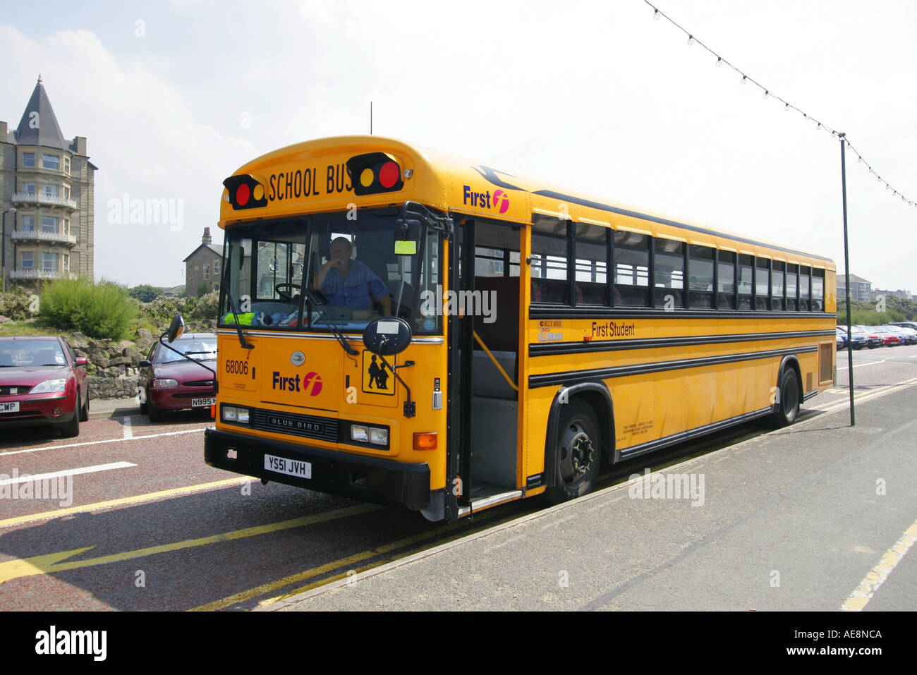 American style school bus parked and waiting in Weston super Mare Stock