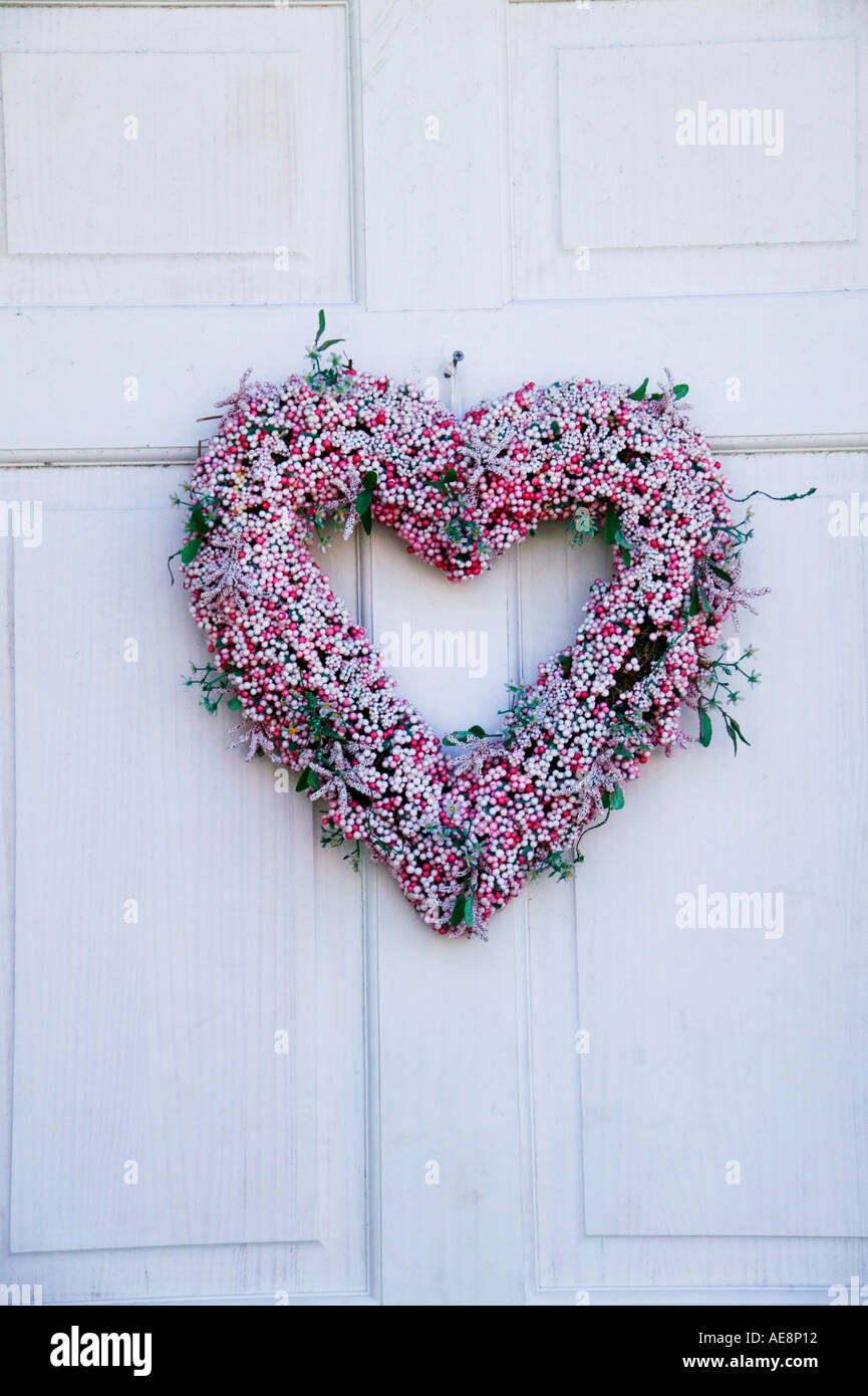 Wreath heart on old door Stock Photo
