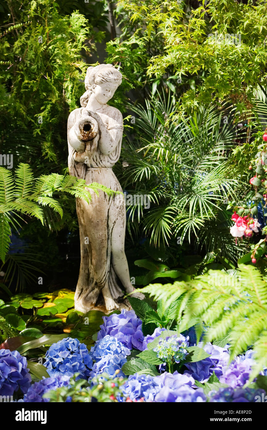 Statue in garden Stock Photo Alamy