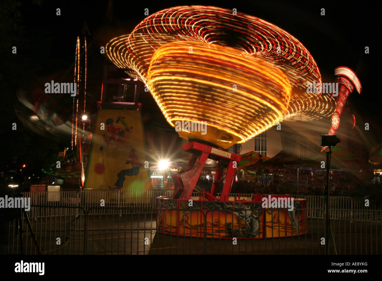 Spinning carnival ride hi-res stock photography and images - Alamy
