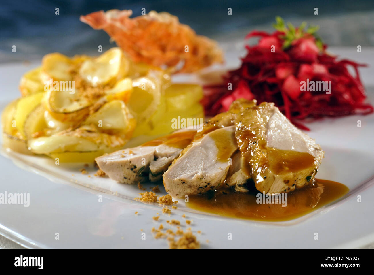 Roast chicken with gravy and dauphinoise potatoes Stock Photo Alamy