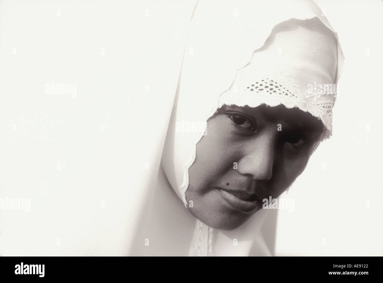 Javanese woman wearing traditional Muslim jilbab in Java Indonesia