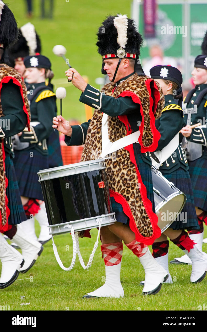 Drummer in leopard skin Pipe band at Scottish show Stock Photo