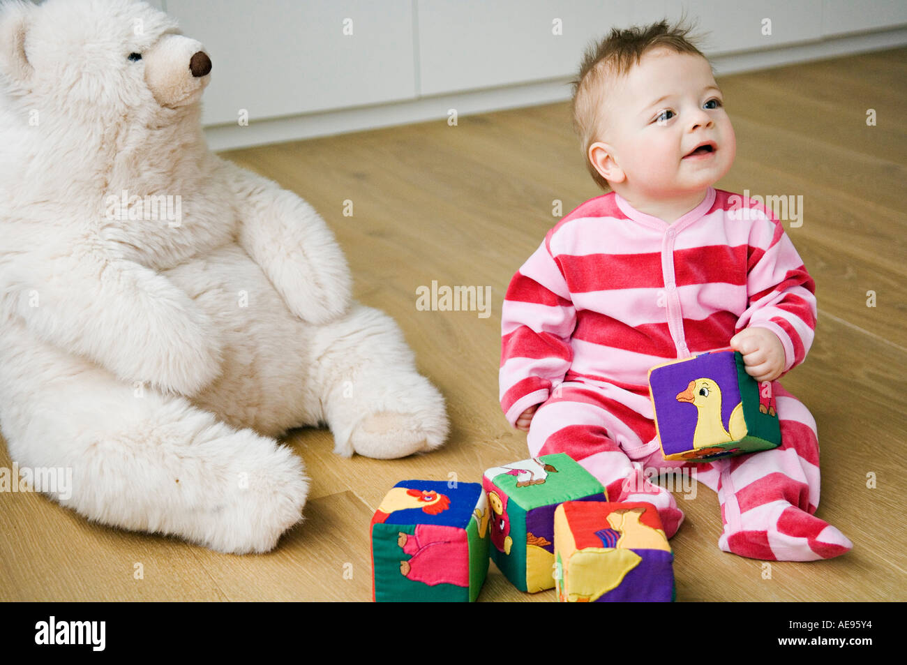 Boy sitting floor hi-res stock photography and images - Alamy