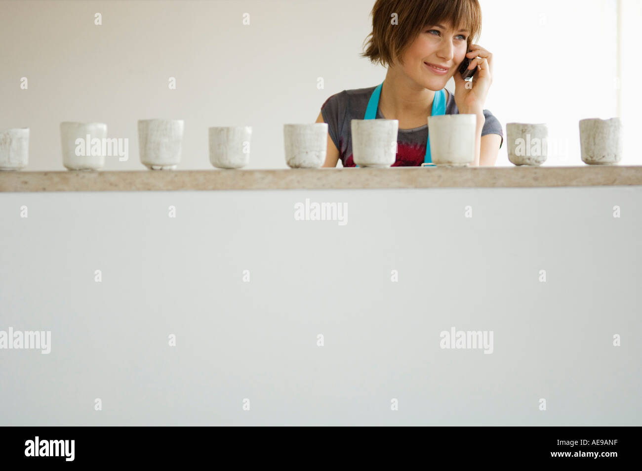 Young woman using mobile phone Stock Photo