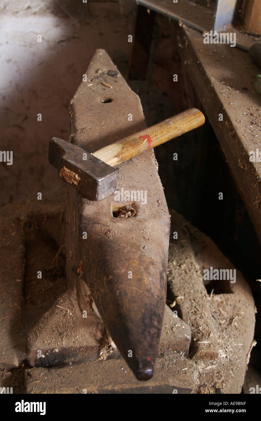 Hammer and anvil Stock Photo Alamy