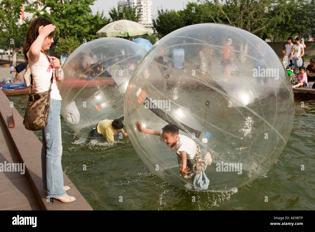 children-play-in-a-plastic-bubble-or-cub