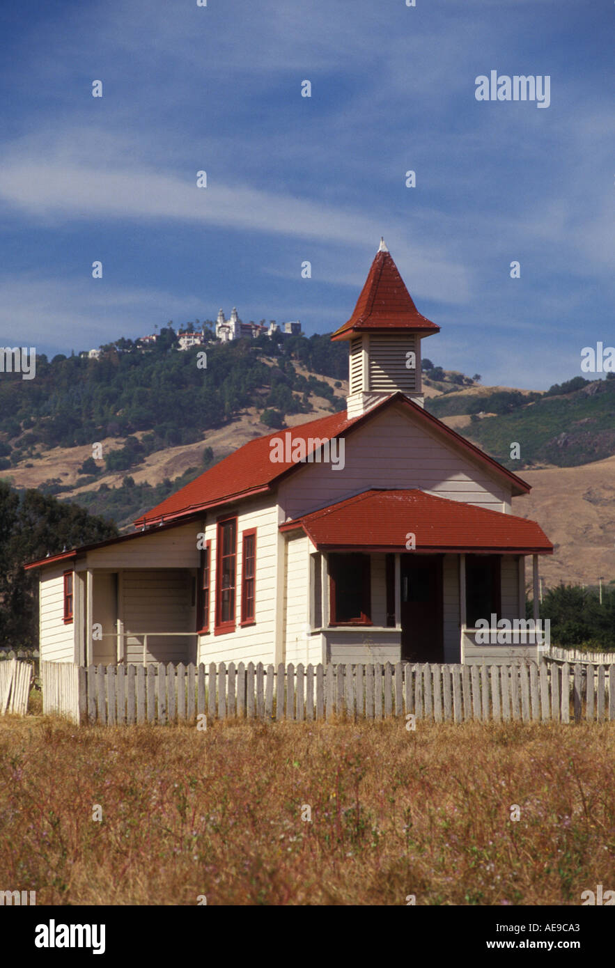 California San Simeon Old School House view toward Hearst Castle on hill top Stock Photo