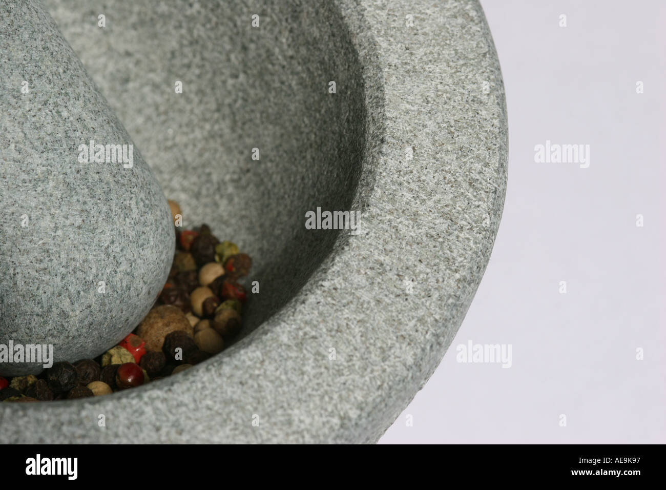 0216 Mixed Pepper Corn in a Pestle and mortar 7 Stock Photo