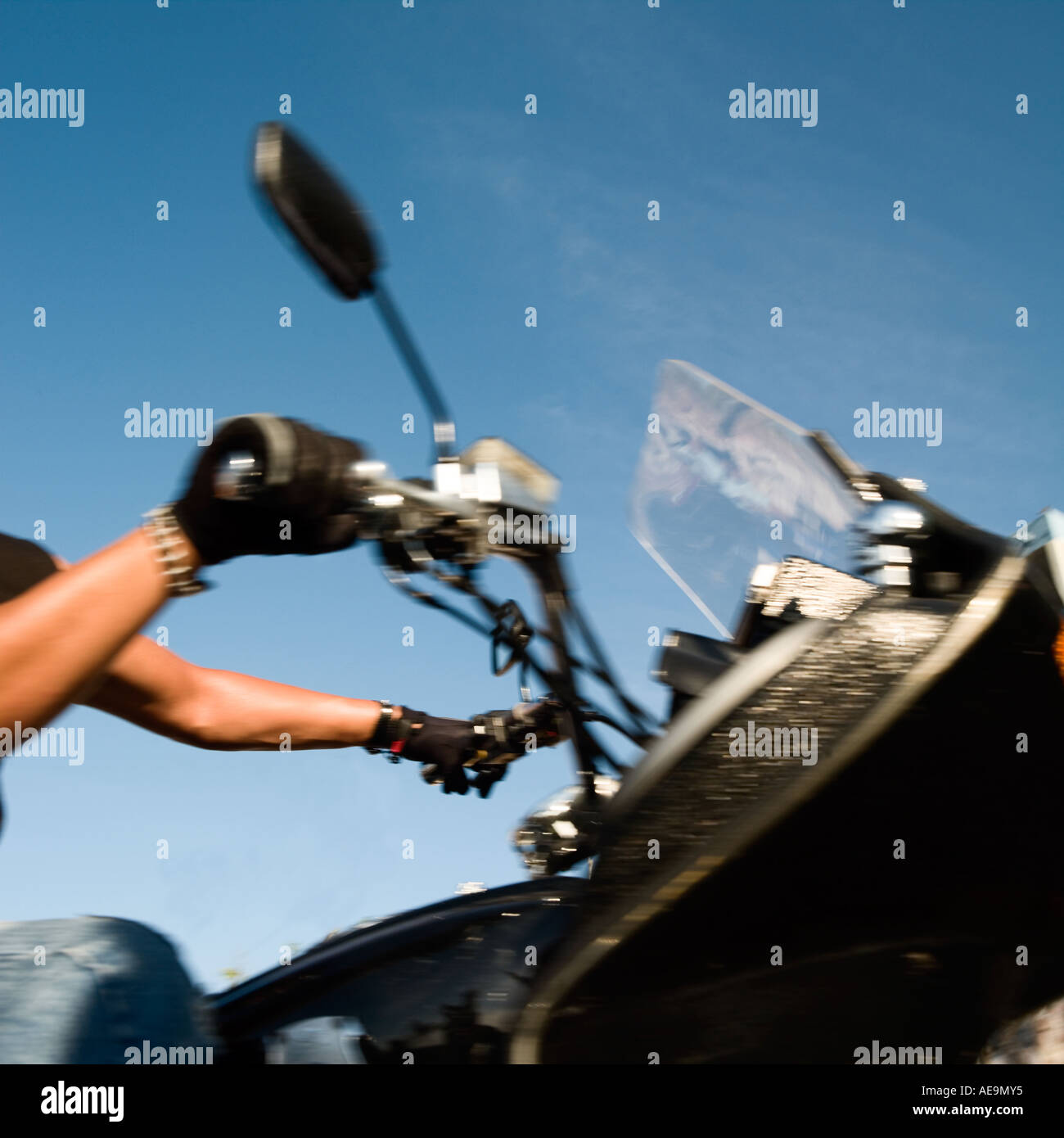 motorbike rider handlebars and throttle detail No model release