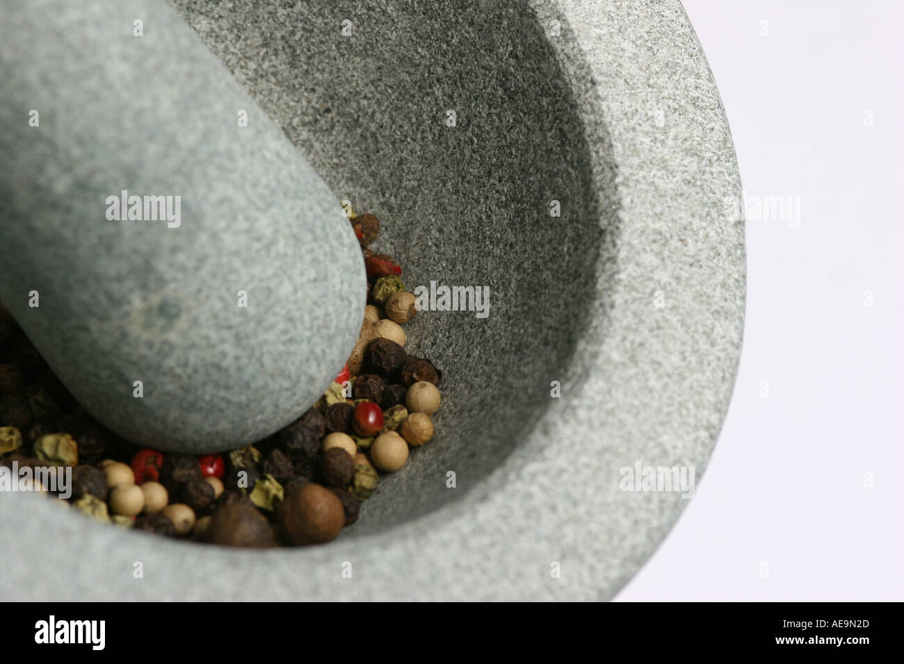 0219 Mixed Pepper Corn in a Pestle and mortar 10 Stock Photo