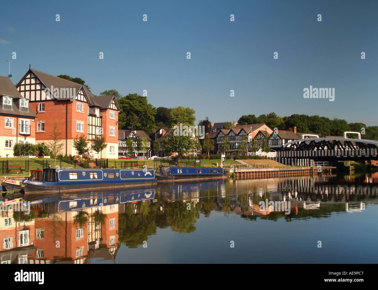 Waterfront Houses and Town Bridge Over the River Weaver Northwich Cheshire England UK Stock Photo
