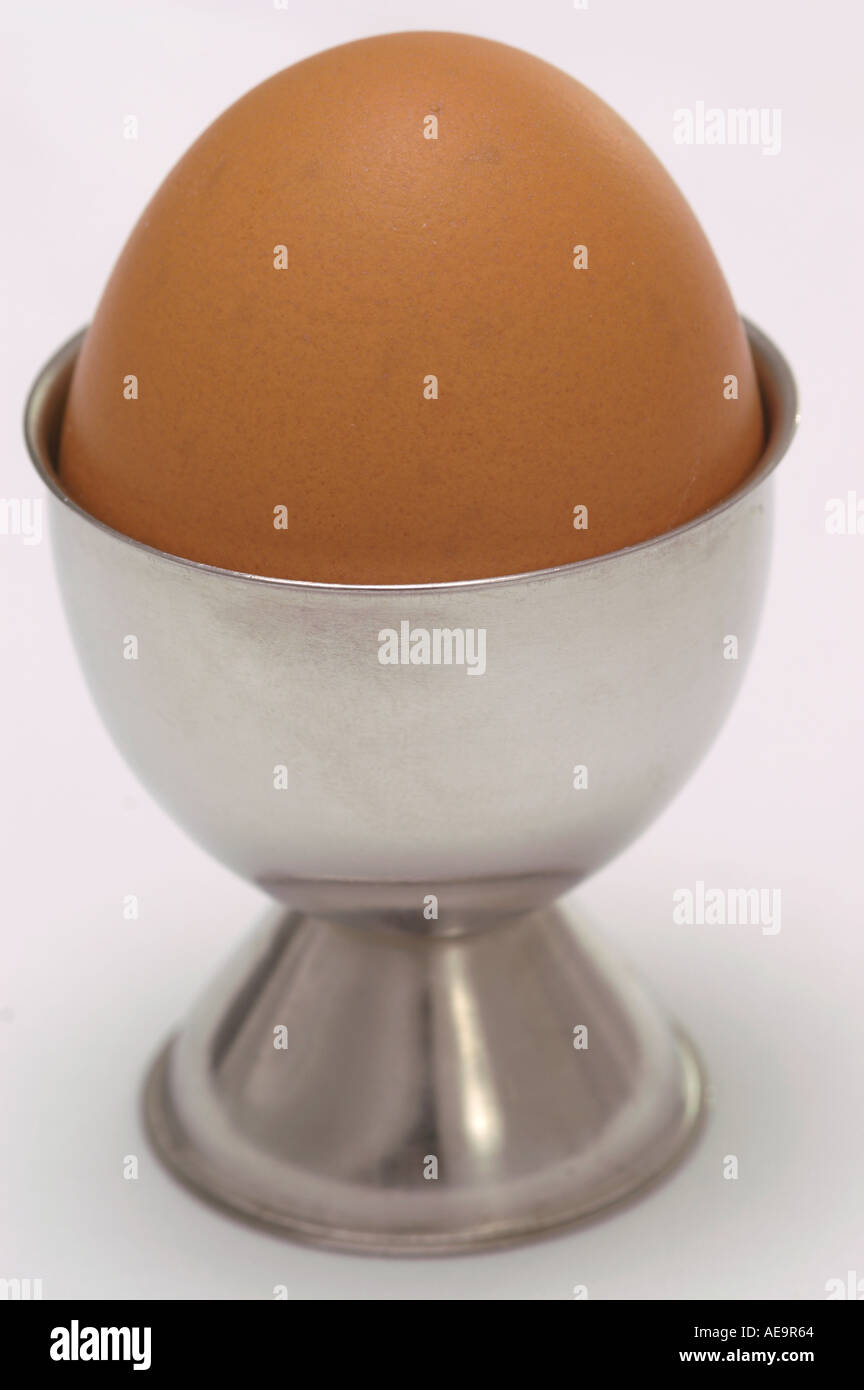 Egg in Silver chrome egg cup Stock Photo