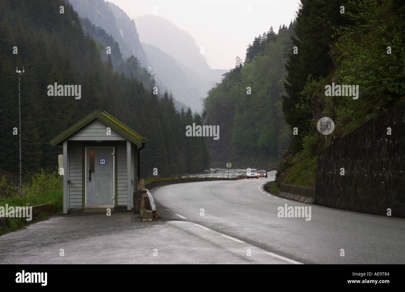 Layby with public toilet in rainy weather Norway Stock Photo Alamy