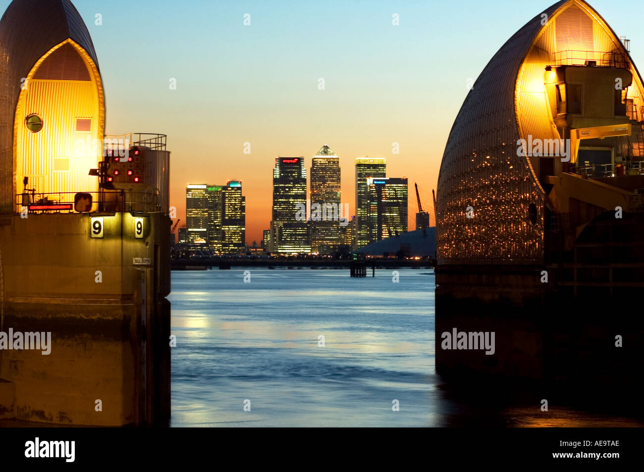 thames barrier river thames london england uk dusk canary wharf in ...