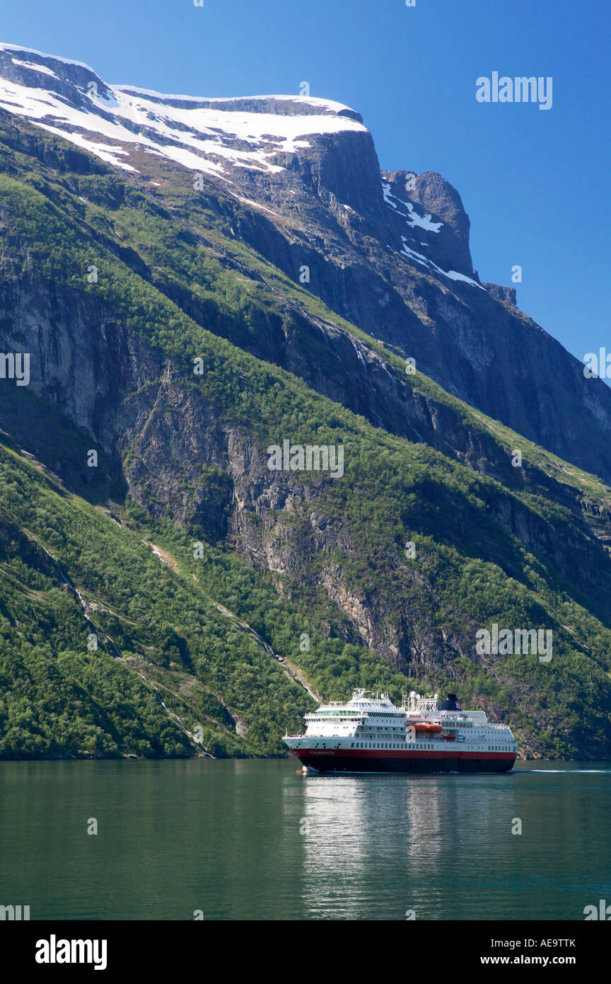 The Hurtigruten coastal ferry MS Finnmarken in Geirangerfjorden near Geiranger Stranda More og Romsdal Norway Stock Photo