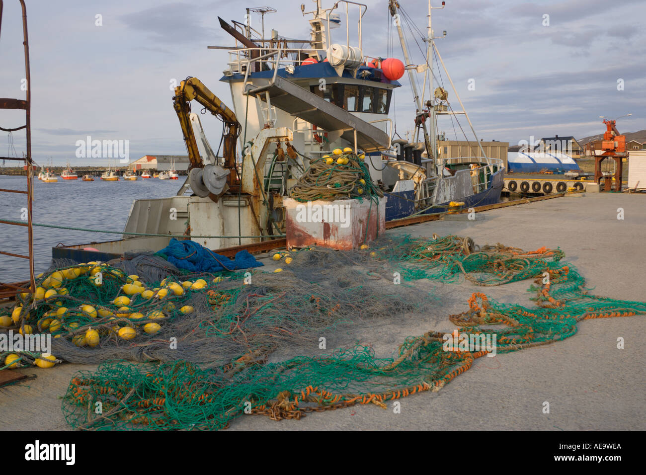 Fishing boat and nets at Berlevag Harbour Finnmark Norway Stock Photo