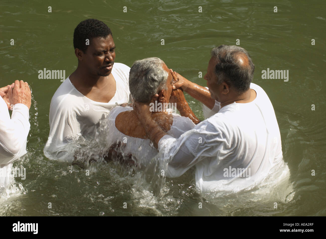 Baptising at the Jordan River Israel At the place that according to legend  John the Baptist baptised Jesus Christ Stock Photo - Alamy