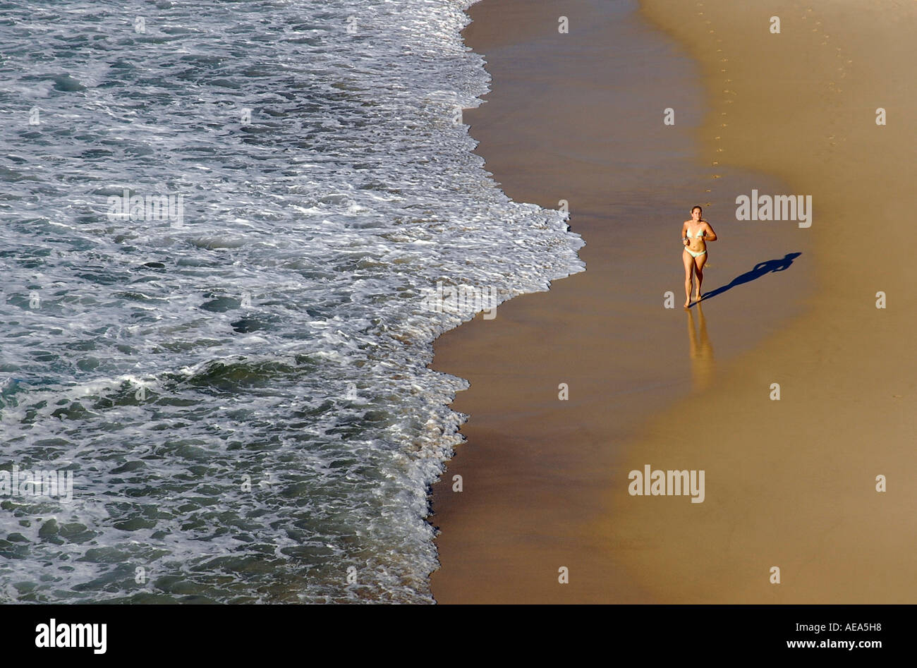 Aerial View Of A Bikini Clad Woman Jogging On Bronte Beach In Sydney