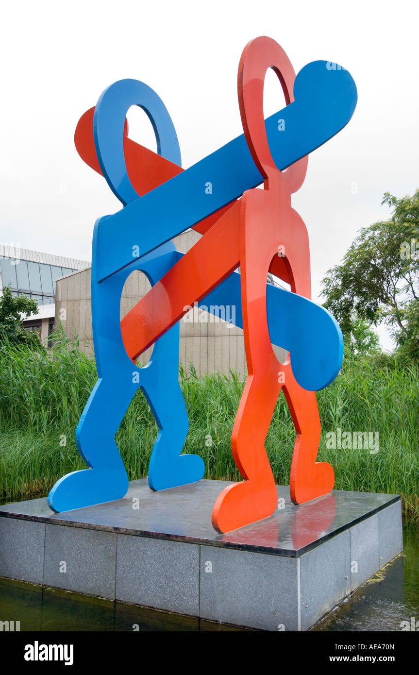 BERLIN near Potsdamer Platz keith haring UNTITLED boxer 1987 collection DaimlerChrysler red blue metal steel iron Stock Photo