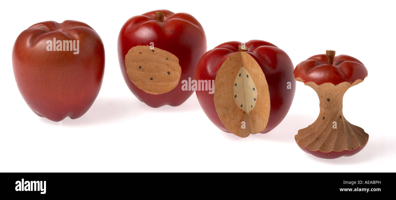 Wooden apples in various stages of being eaten Stock Photo Alamy