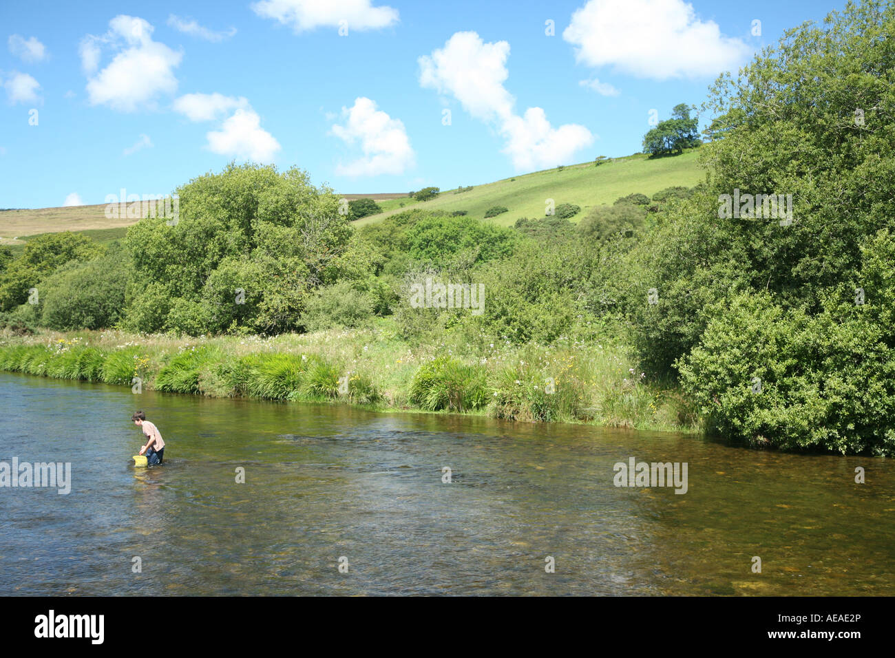 Boy playing in river hi-res stock photography and images - Alamy