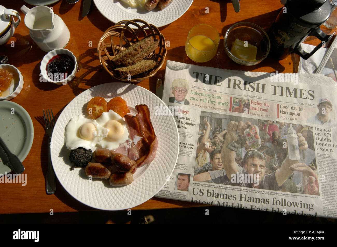 Full Irish breakfast, Heron's Cove hotel Goleen Ireland - sausage bacon eggs black pudding Times newspaper on table Stock Photo