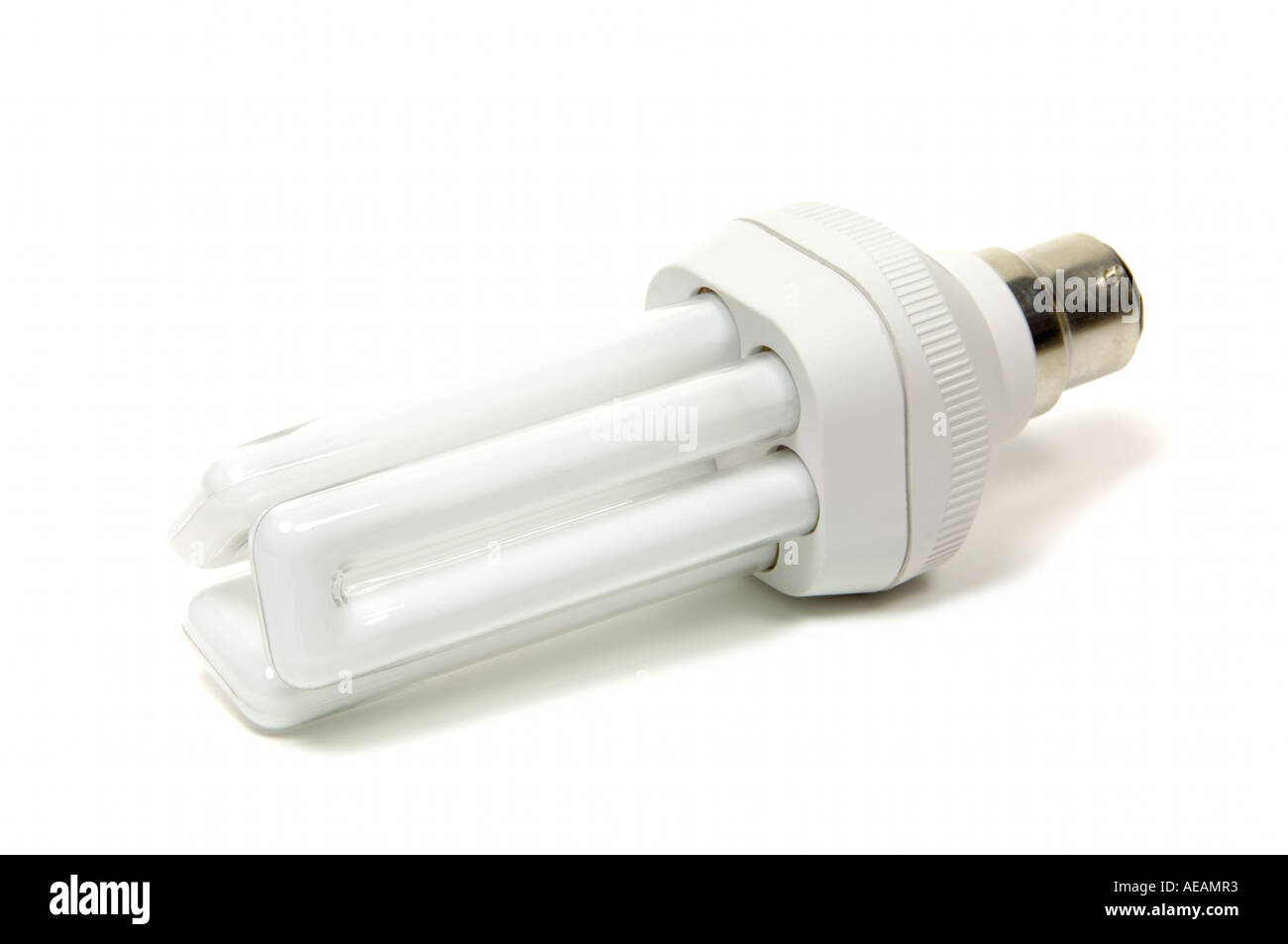Energy efficient fluorescent bayonet lightbulb Stock Photo