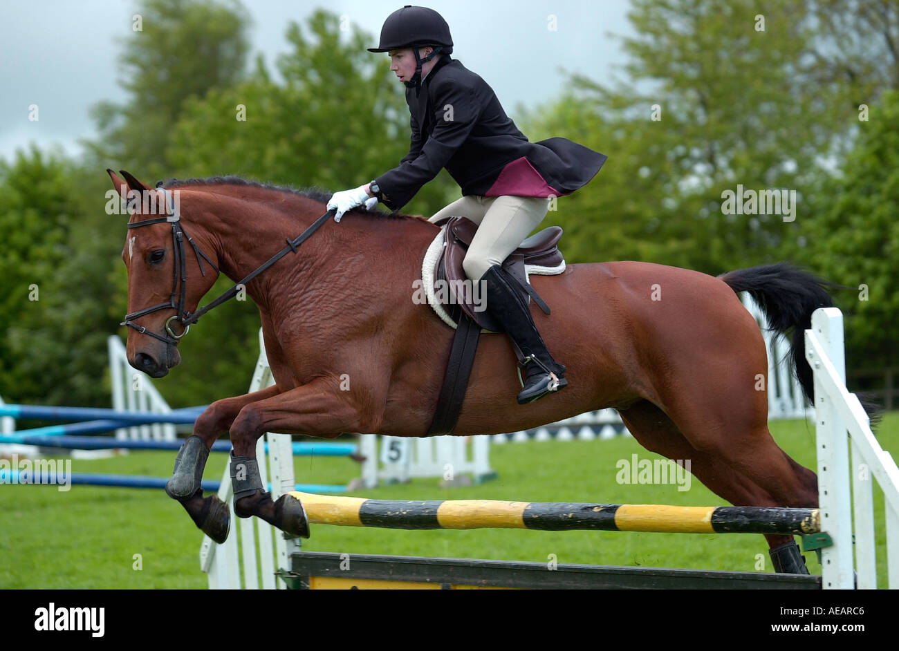 Young rider competing in equine event in Oxfordshire on horse called