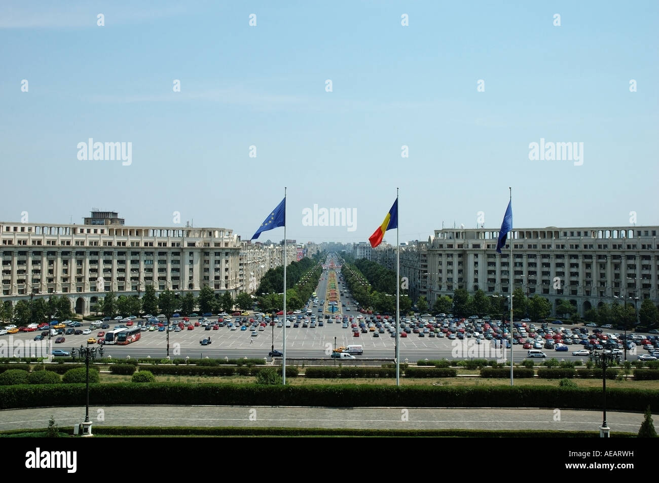 Road perspective, wide arial view of Constitution Square, tree and fountain lined Union Avenue, Bucharest, Romania, Europe, EU Stock Photo
