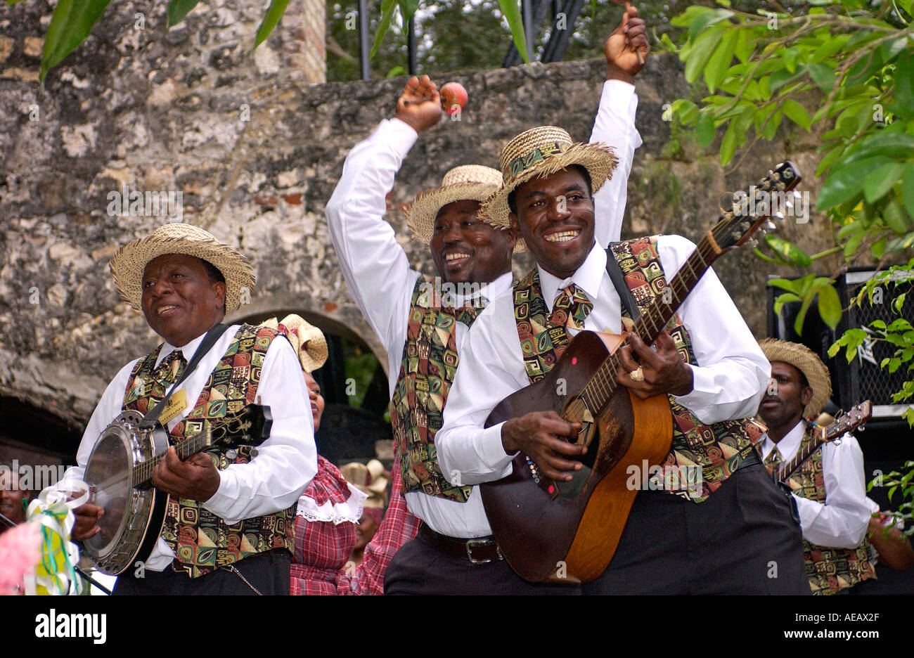Muscians playing guitar banjo and maracas at the Governor General s