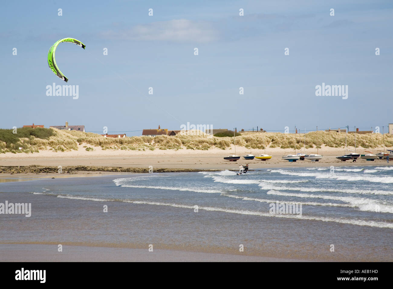 Kite surfers at Beadnell Bay Northumberland England UK Stock Photo