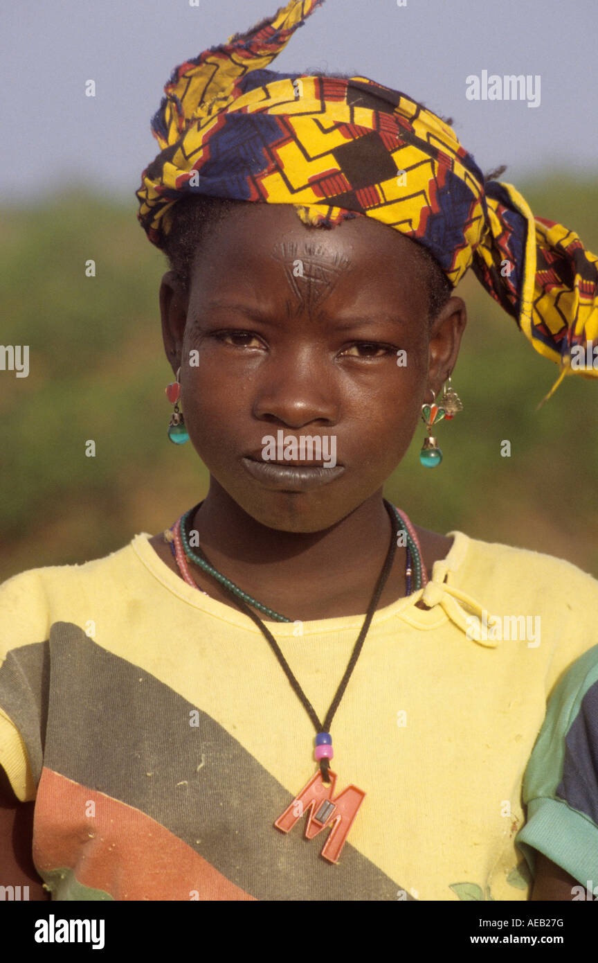 Near Niamey, Niger. Fulani Girl with Facial Tattoos, Jewelry Stock Photo