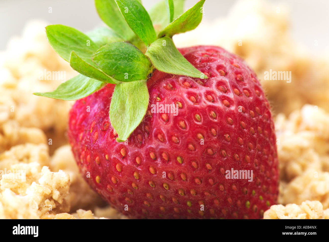 Ripe Strawberry in granola cereal Stock Photo Alamy