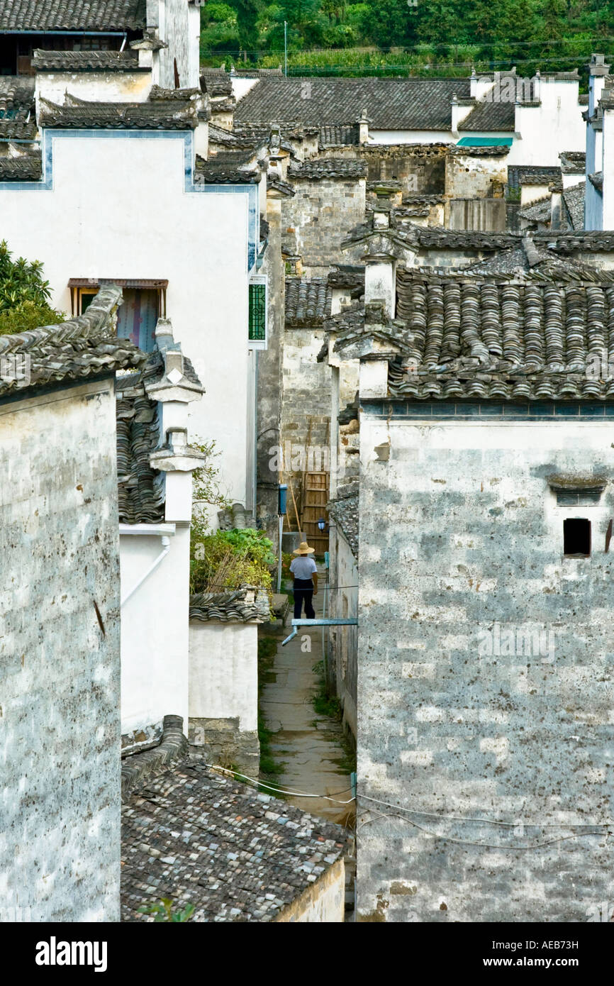 Local Man Walking Through Ancient Huizhou Style Chinese Village Xidi China Stock Photo