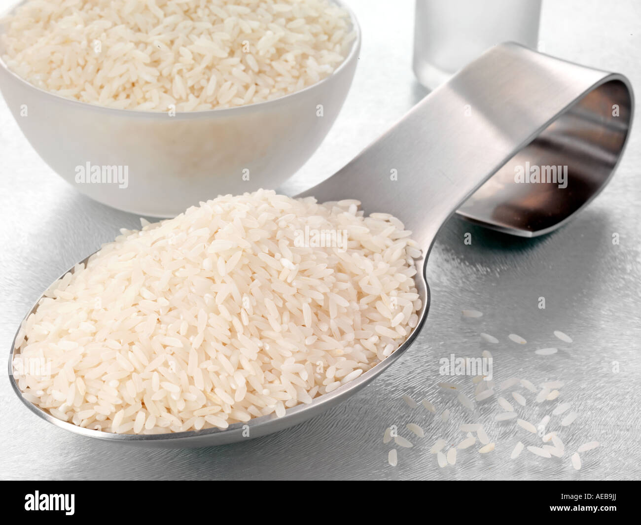 Large Spoon Rice SPOONFUL OF LONG GRAIN RICE Stock Photo - Alamy
