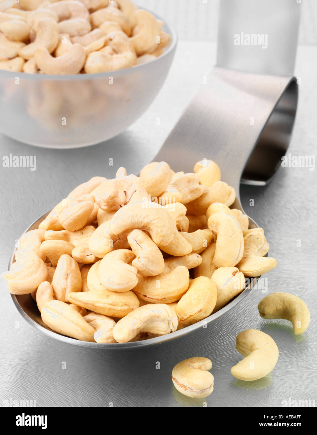 SPOONFUL OF CASHEW NUTS Stock Photo