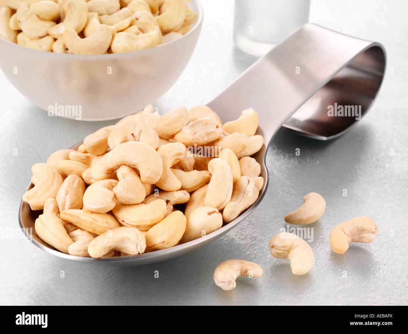 SPOONFUL OF CASHEW NUTS Stock Photo