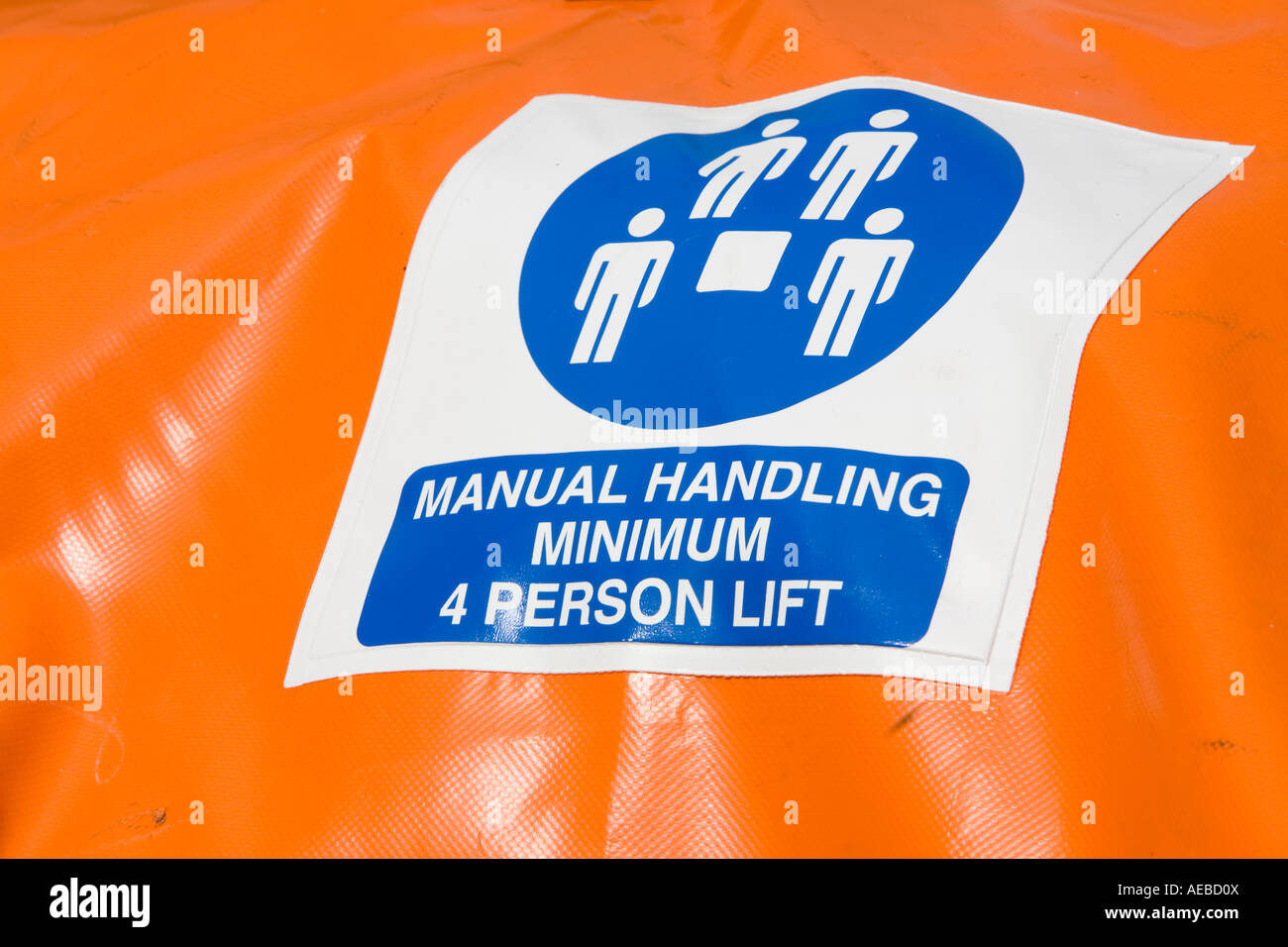 Manual handling notice on firemans equipment Stock Photo