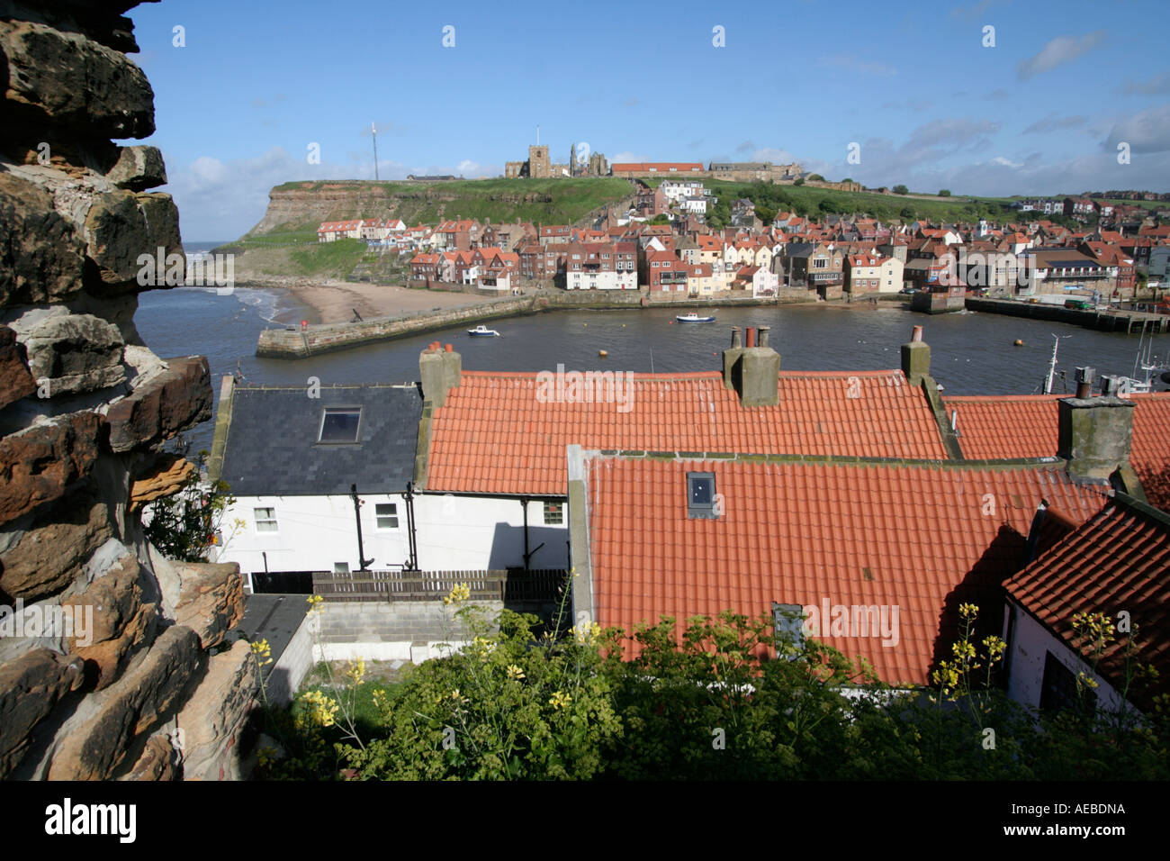 whitby across the rooftops north yorkshire coastal town england uk gb ...