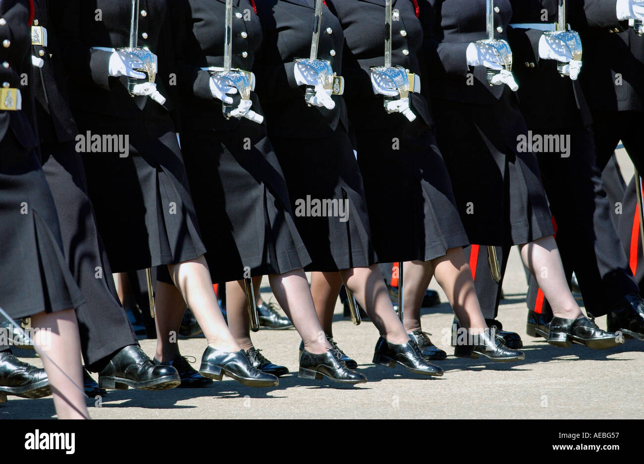 Female Soldiers marching during the Passing Out Parade at Sandhurst Royal Military Academy Surrey Stock Photo