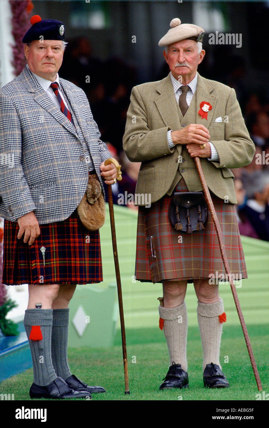 Traditional Scotsmen with tartan kilts and sporrans at the Braemar Games a Highland gathering Scotland Stock Photo