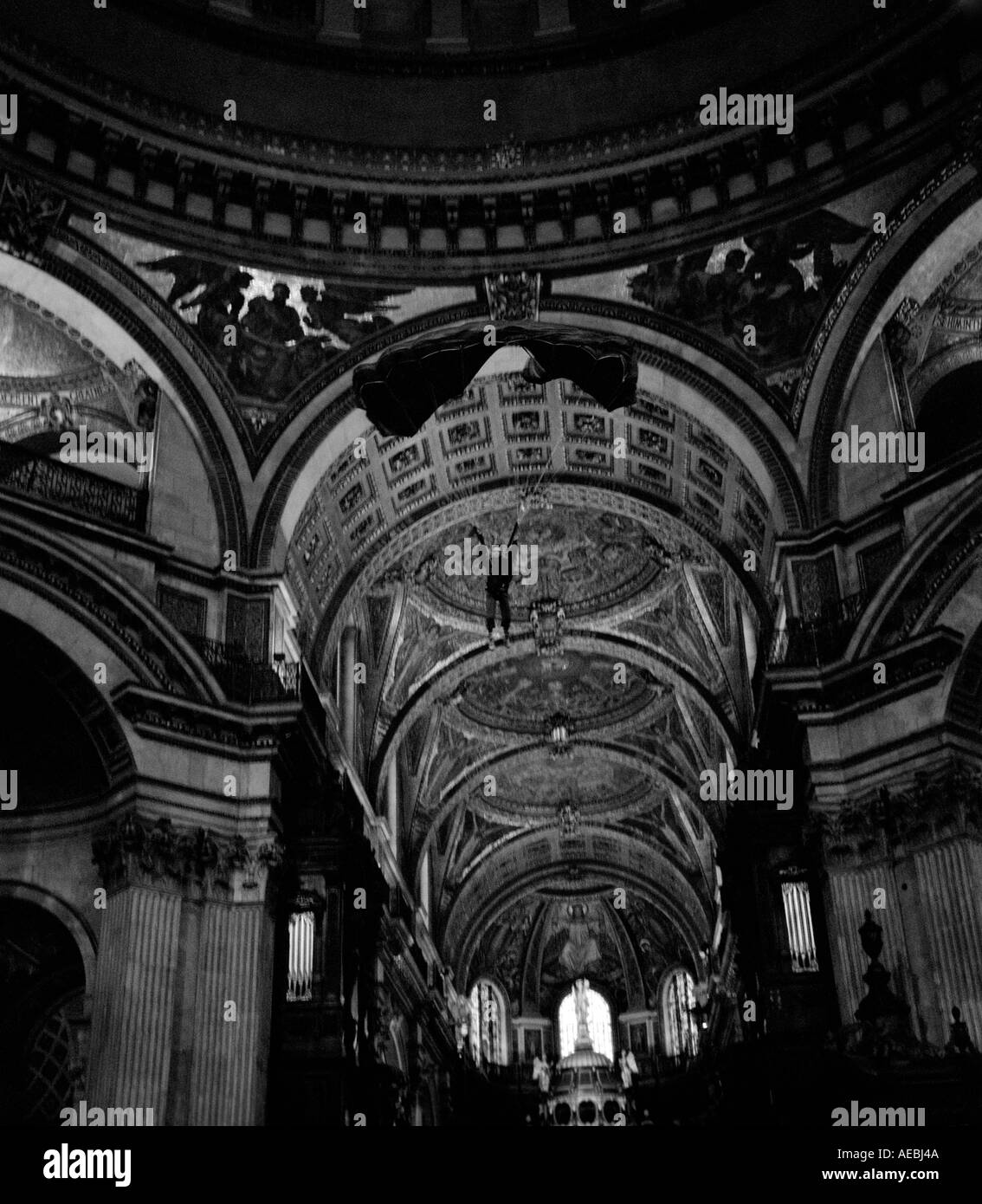 Russell Powell BASE 230 BASE Jumping from the Whispering Gallery inside St Pauls Cathedral London. Picture copyright Doug Blane. Stock Photo